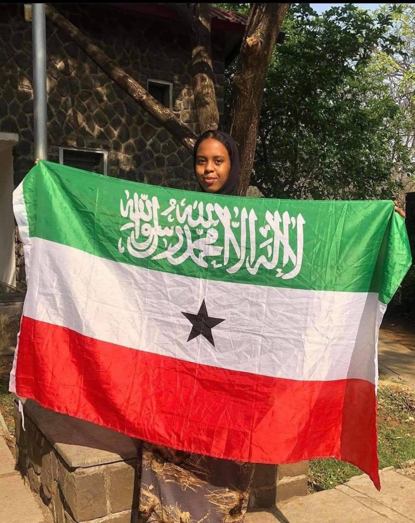UWC Somaliland student holding u flag